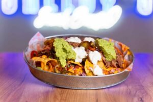 fuente de nachos all in SHELBY´S Smash burger entrante